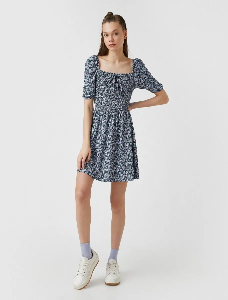 Floral Smocked Puff Sleeve Mini Dress in Blue