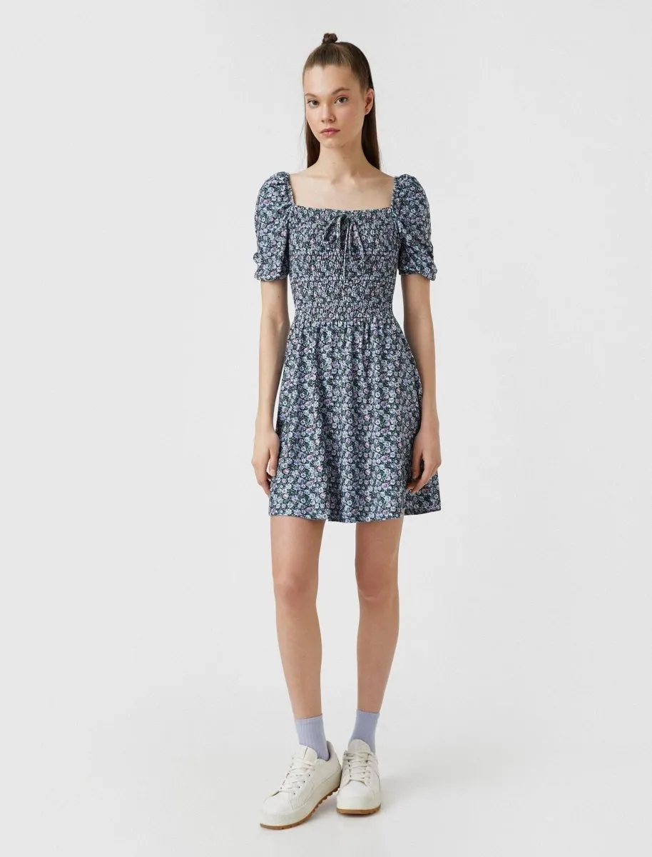 Floral Smocked Puff Sleeve Mini Dress in Blue