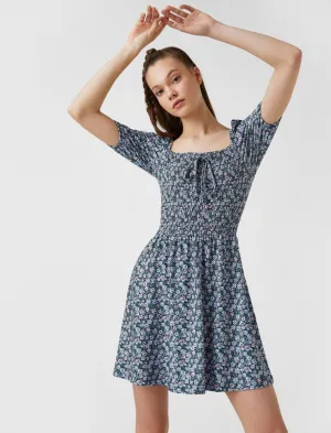 Floral Smocked Puff Sleeve Mini Dress in Blue
