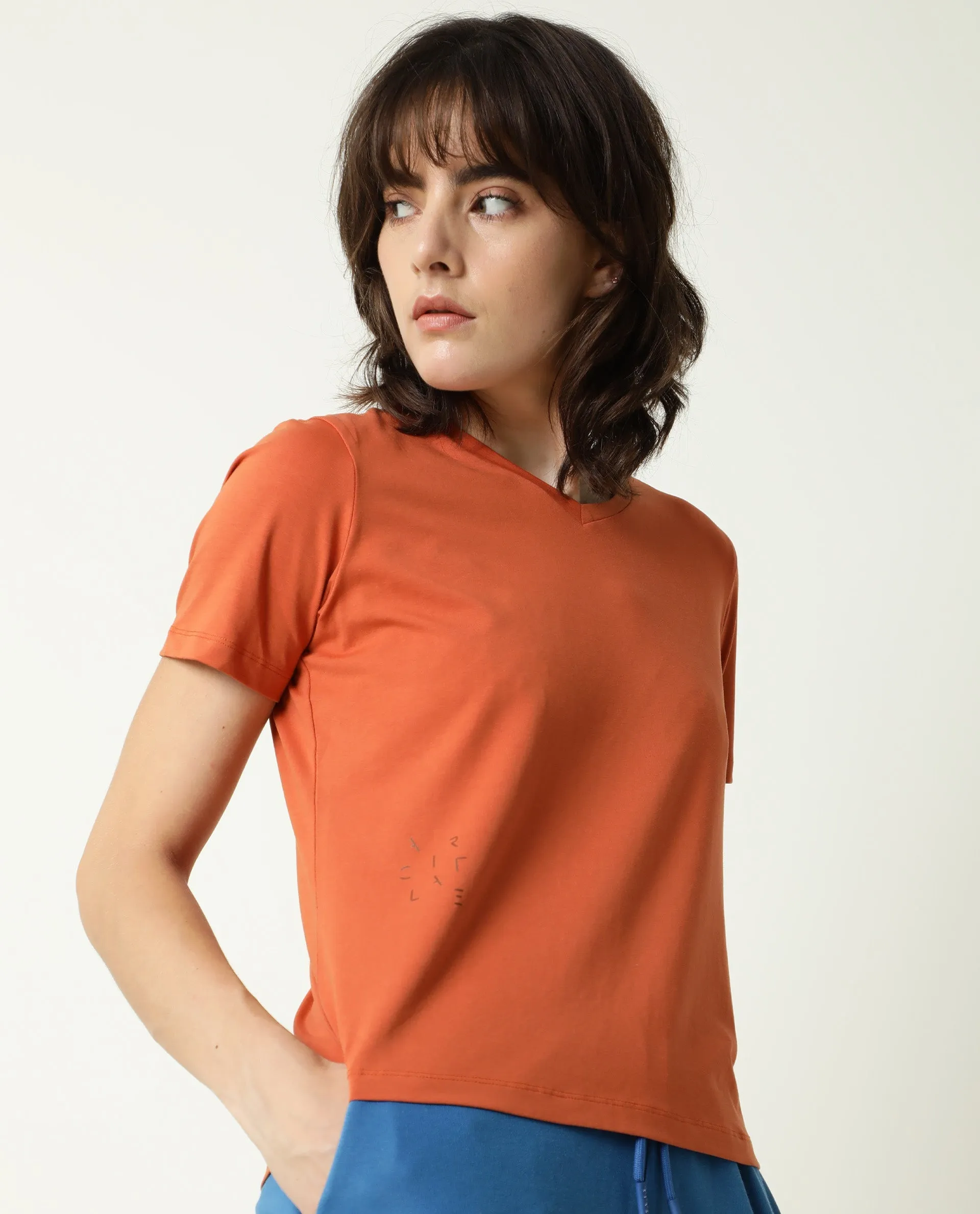 Rareism Women Arvi Orange Cotton Blend Fabric Relaxed Fit Half Sleeves Solid V-Neck T-Shirt