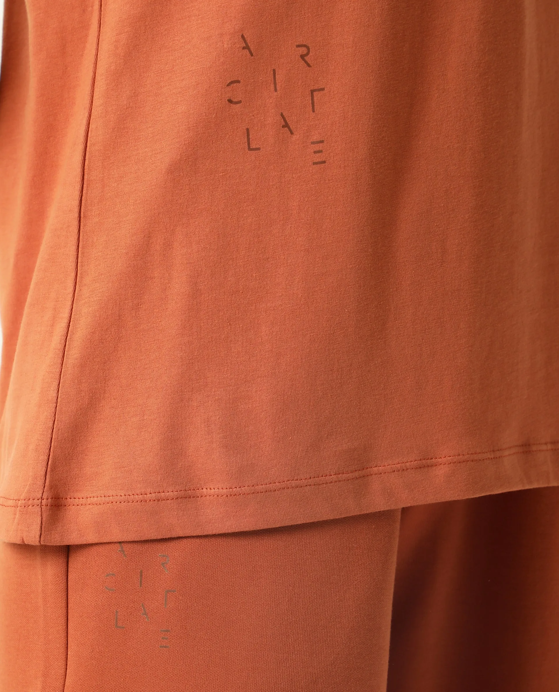 Rareism Women Arvi Orange Cotton Blend Fabric Relaxed Fit Half Sleeves Solid V-Neck T-Shirt